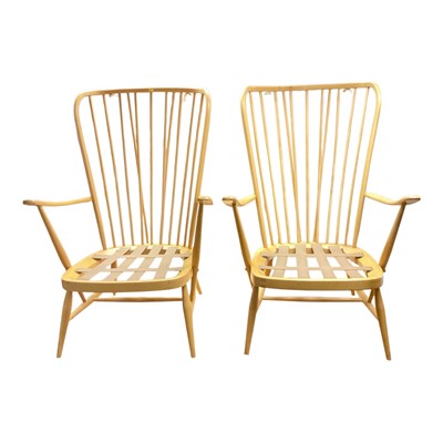 Lot 1472 - Pair of Ercol elm stick back elbow chairs