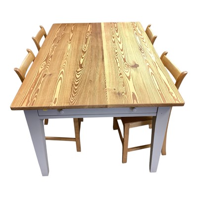 Lot 1473 - Modern pine farmhouse style kitchen table with end drawers on painted legs, 152.5cm x 98.5cm x 76.5cm high, together with a set of four modern Suffolk chairs with ball and bar backs