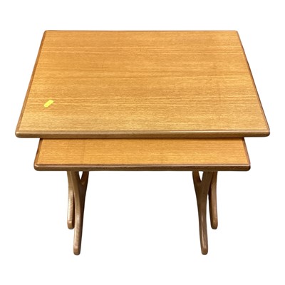 Lot 1475 - Nest of two mid century teak occasional tables