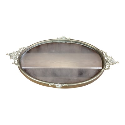 Lot 1486 - Oval wall mirror in brass frame, 64cm x 39.5cm, together with a gilt framed wall mirror, 55cm x 38cm (2)