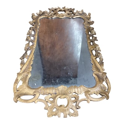 Lot 1489 - Antique style wall mirror in gilt frame with pierced decoration, 88cm x 48cm