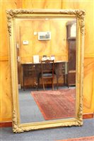Lot 1486 - Victorian gilt gesso wall mirror with...