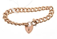 Lot 541 - Edwardian rose-coloured metal curb link...