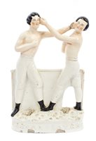 Lot 4 - Rare Victorian Staffordshire pottery pugilist...