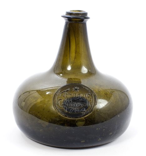 Lot 110 - Fine early 18th century green glass seal...