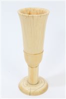Lot 693 - Early German turned ivory cup of slender...