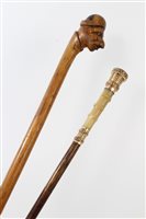 Lot 750 - Victorian carved hardwood novelty walking...