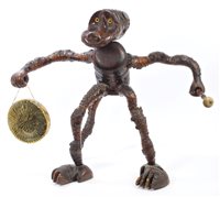 Lot 782 - Early 20th Century root carving dinner gong in...