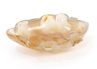 Lot 850 - Chinese carved agate brush pot of dished leaf...