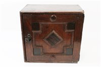 Lot 852 - Late 17th century oak geometric moulded spice...