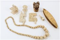 Lot 873 - Collection of carved ivories - including three...
