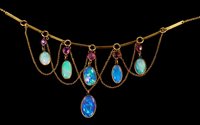 Lot 559 - Edwardian opal and ruby fringe necklace with...
