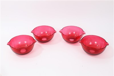 Lot 146 - Set of four 19th century ruby glass rinsers with twin spouts, 15cm
