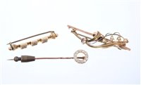Lot 606 - Victorian diamond stick pin with a circle of...