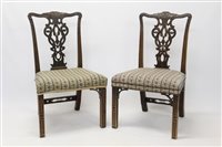 Lot 1306 - Elaborate pair of Chippendale-style side...