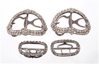 Lot 610 - Two pairs of George III paste set shoe buckles...