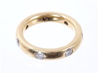 Lot 583 - 18ct yellow gold wedding ring with seven...