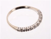 Lot 584 - French 18ct white gold diamond half eternity...
