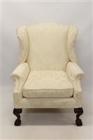 Lot 1262 - 18th century style mahogany wing armchair...