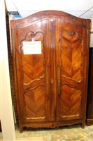 Lot 1277 - Late 18th French chestnut armoire of arched...