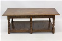 Lot 1349 - 17th century style carved oak coffee table...