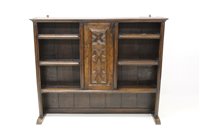 Lot 1354 - Charles II style oak boarded rack with central...
