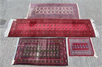 Lot 1396 - Pakistan Bokhara runner with two rows of...
