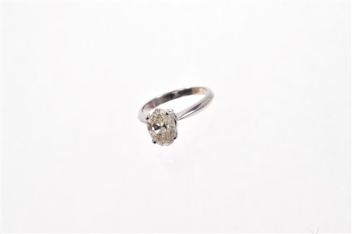 Lot 540 - Diamond single stone ring with an oval cut...