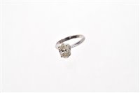 Lot 540 - Diamond single stone ring with an oval cut...