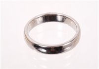 Lot 542 - Tiffany & Co platinum wedding ring, stamped...