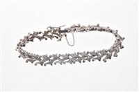 Lot 581 - 18ct white gold diamond bracelet with...