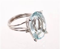 Lot 509 - Aquamarine and diamond cocktail ring with a...