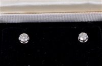 Lot 510 - Pair of diamond stud earrings, each with a...