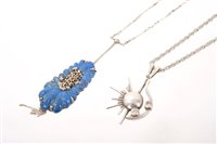 Lot 513 - 1950s diamond and silver pendant of abstract...