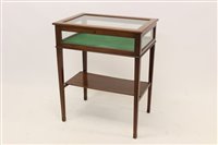 Lot 1231 - Mahogany bijouterie table with hinged glazed...