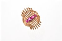Lot 505 - 1950s/1960s ruby and gold cocktail ring with a...