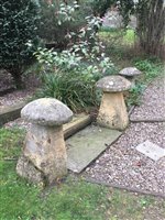 Lot 1381 - Antique staddle stone, together with another...
