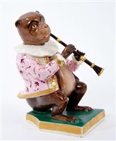Lot 21 - Early 19th century Derby figure of a monkey...