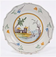 Lot 46 - 18th century French faience plate painted with...