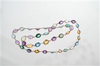 Lot 568 - 9ct gold multi-gem necklace with graduated...