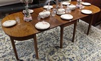 Lot 1274 - George III mahogany D-end dining table with...