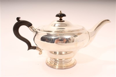 Lot 421 - George V silver teapot of inverted baluster form, 26cm across