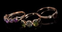Lot 404 - Three Georgian gem-set dress rings to include...