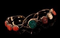 Lot 405 - Three Regency dress rings to include a carved...