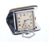 Lot 627 - 1950s Tivoli travel watch with square dial...
