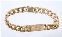 Lot 589 - Gold identity bracelet with applied gold...