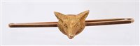 Lot 586 - Gold stock pin applied with a gold Fox's head,...