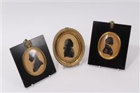 Lot 663 - George III painted silhouette portrait...
