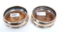 Lot 247 - Pair contemporary silver wine coasters of...