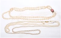 Lot 565 - Cultured pearl two strand necklace with a...